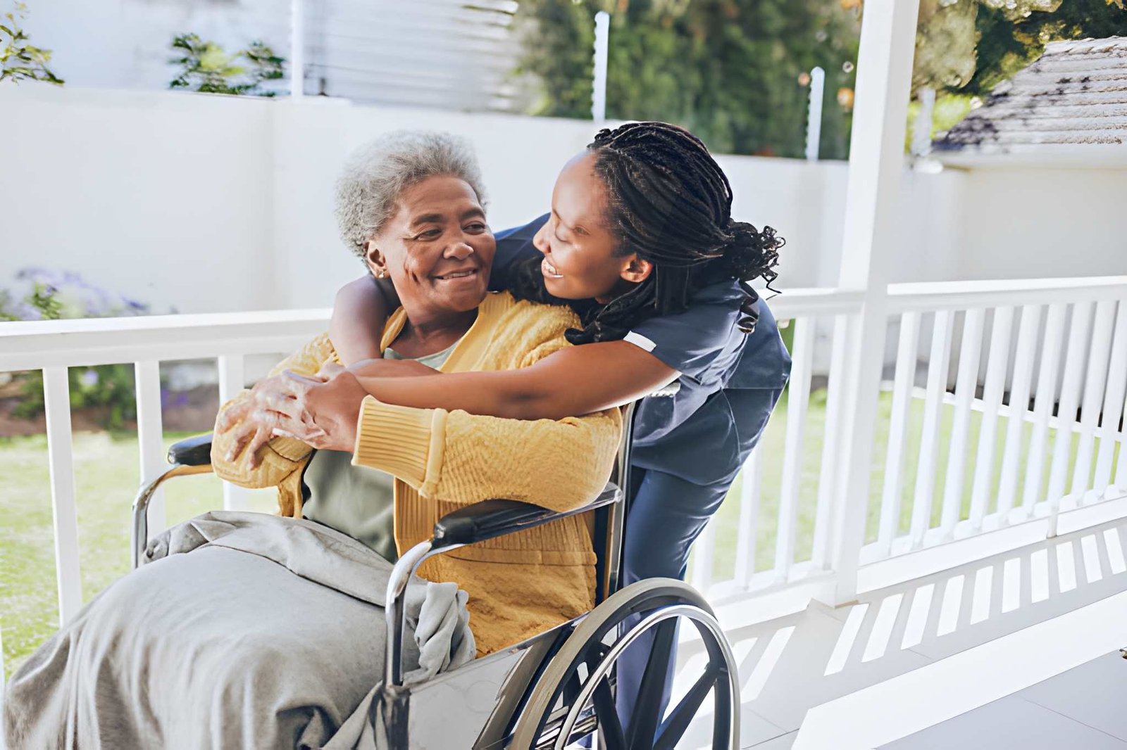 Care team member smiling with family